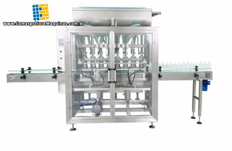 Envasadora para l�quidos, materiais viscosos, pastas e molhos com tampadora e rotutadora