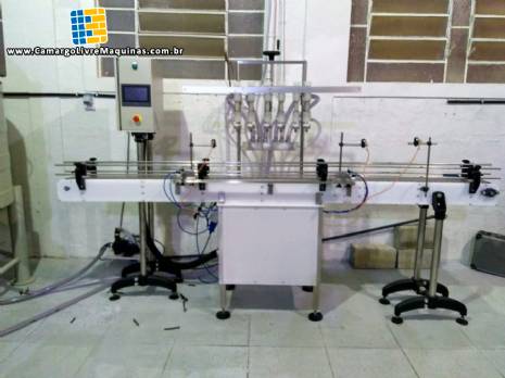 Envasadora para �cidos corrosivos